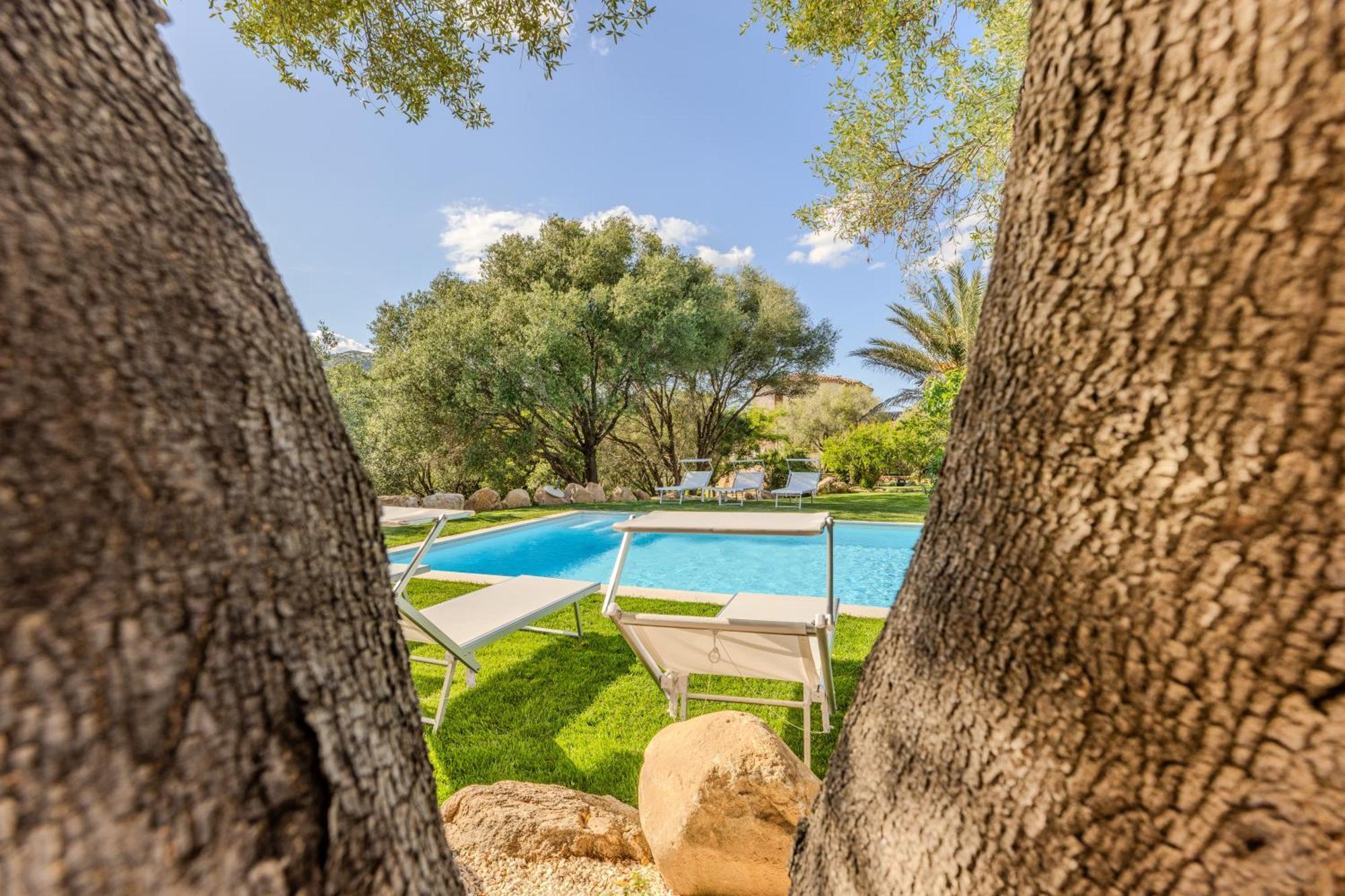 Ferienwohnung Stazzo San Teodoro Piscina Condivisa Exterior foto